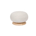 Pouf rond en tissu beige avec base en bois naturel.