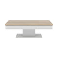 Table basse moderne en bois clair et blanc.